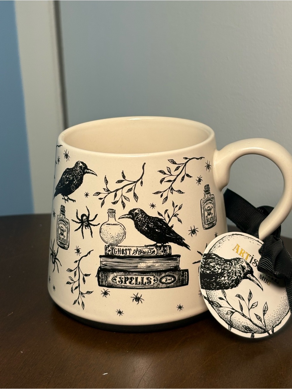 Artisan Raven Ceramic Mug in Cream by